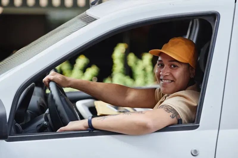 Woman in work vehicle